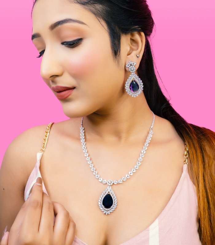 40 CZ american diamond Silver plated necklace set with sapphire blue gemstone